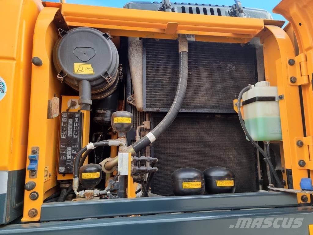 Hyundai Robex 140 W-9 حفارات بعجل