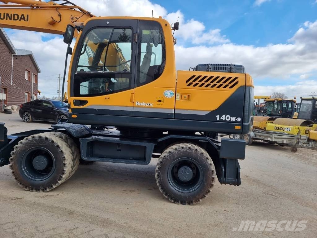 Hyundai Robex 140 W-9 حفارات بعجل