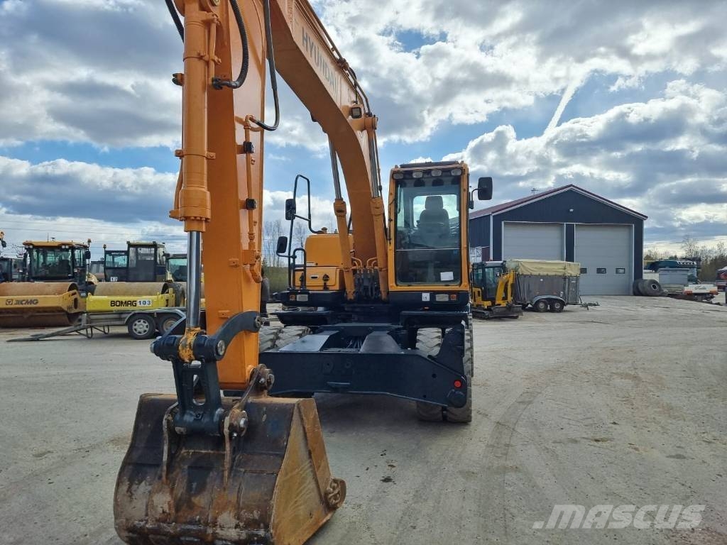 Hyundai Robex 140 W-9 حفارات بعجل