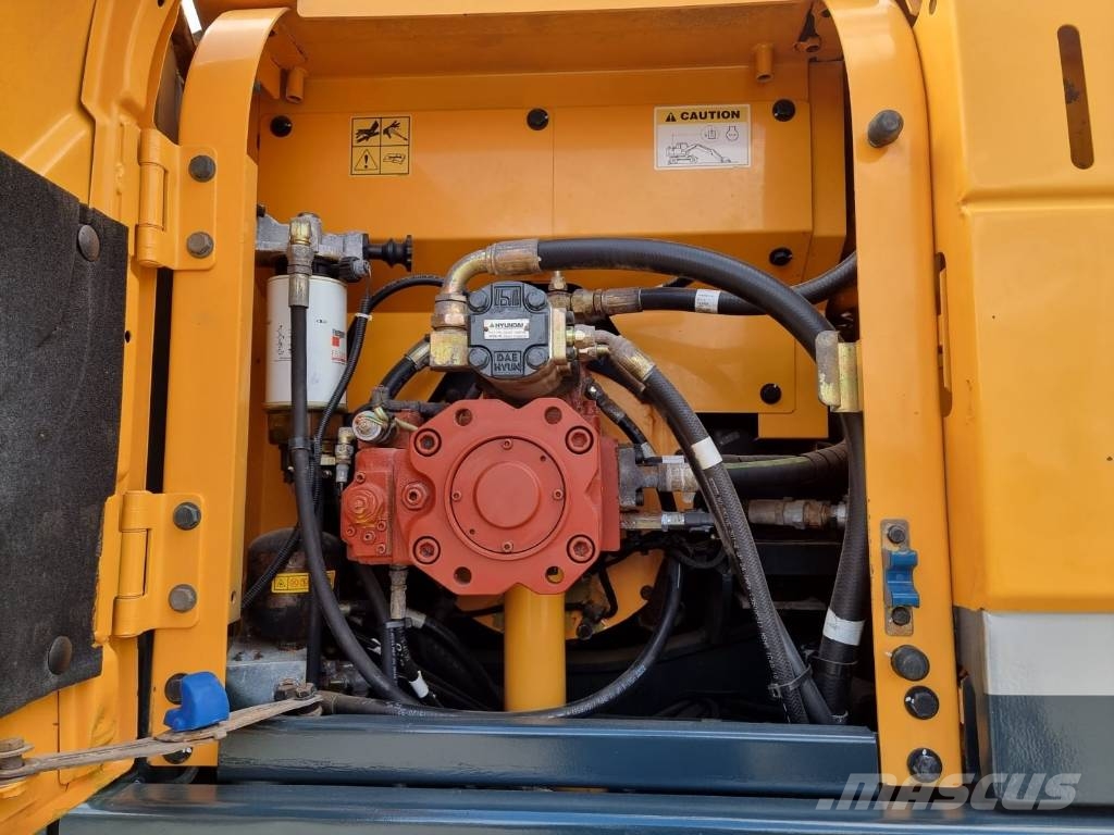 Hyundai Robex 140 W-9 حفارات بعجل