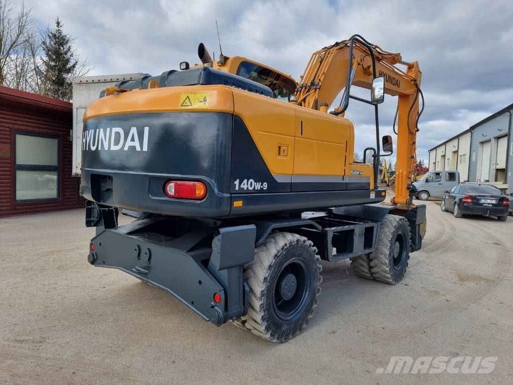 Hyundai Robex 140 W-9 حفارات بعجل