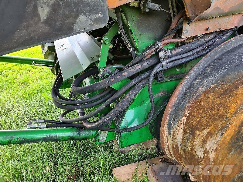 John Deere T560 HM Combine harvesters