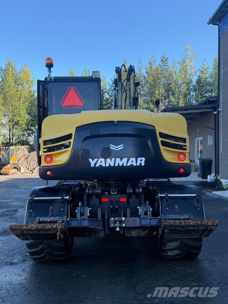 Yanmar B 110 W حفارات بعجل