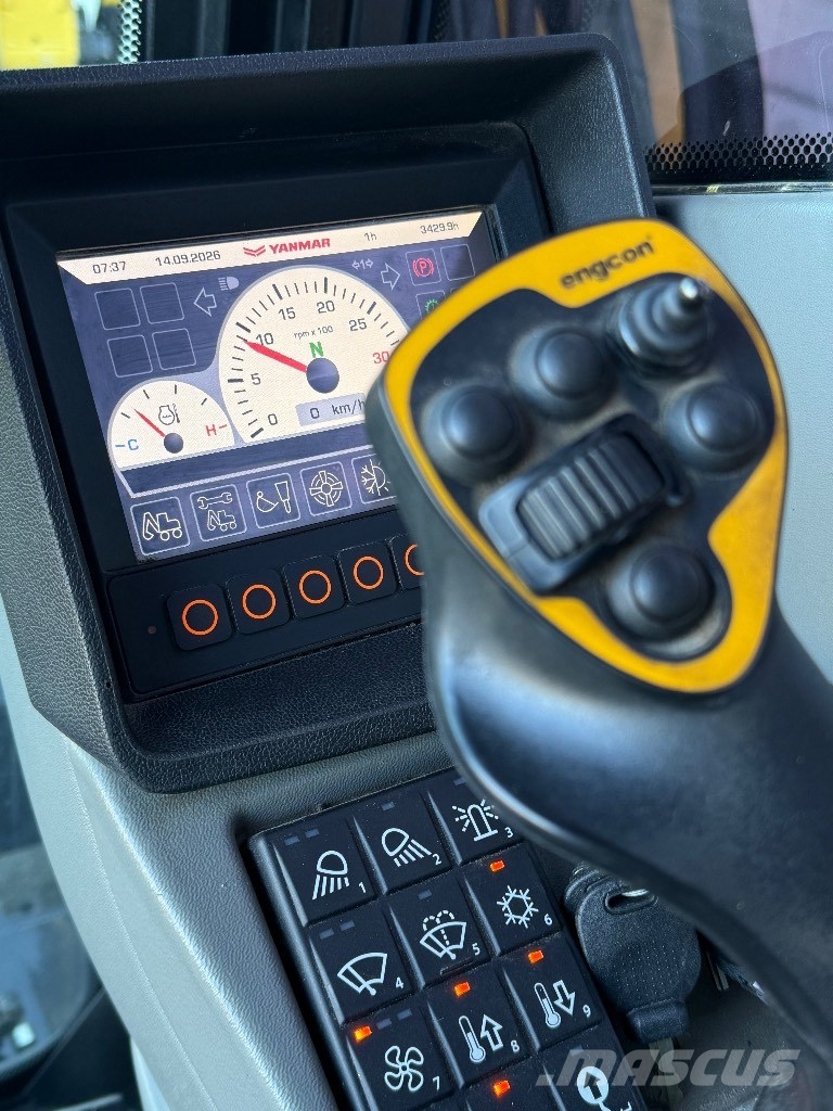 Yanmar B 110 W حفارات بعجل