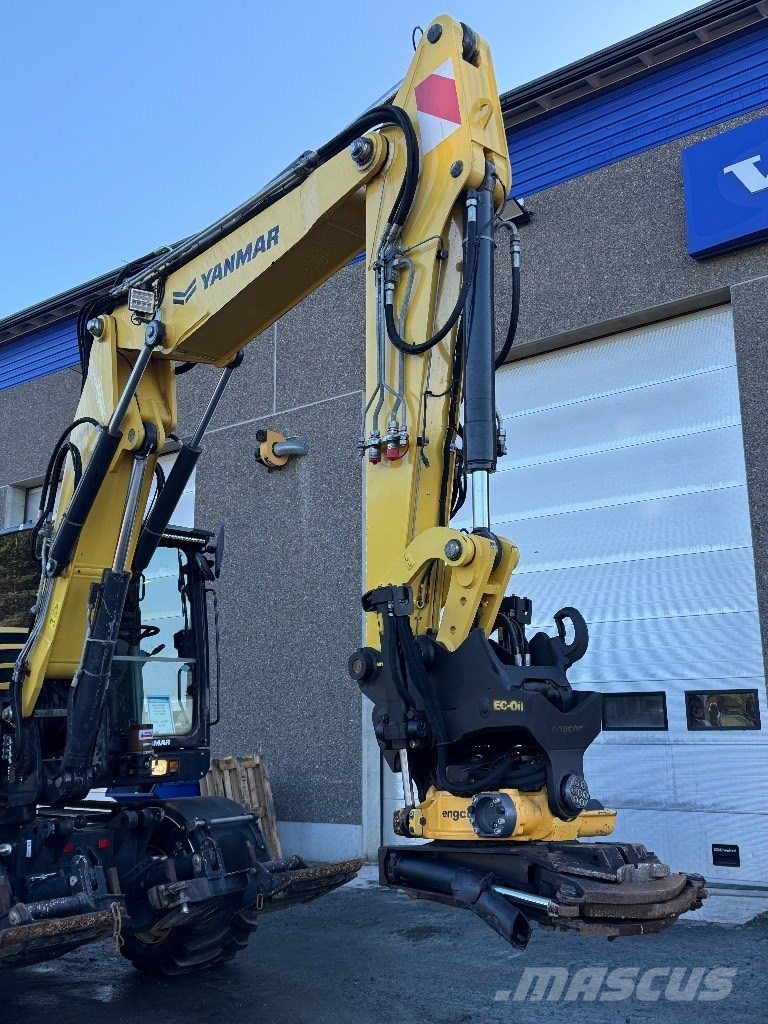 Yanmar B 110 W حفارات بعجل