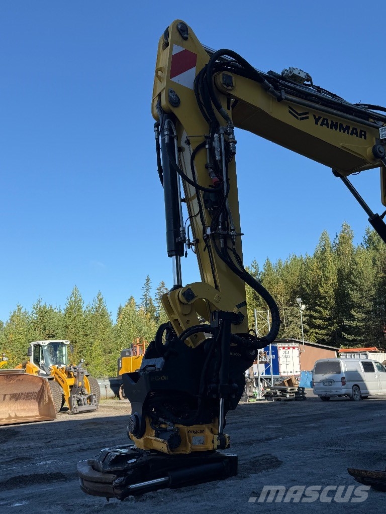 Yanmar B 110 W حفارات بعجل