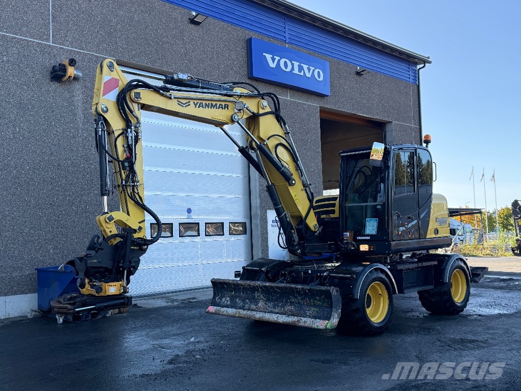 Yanmar B 110 W حفارات بعجل
