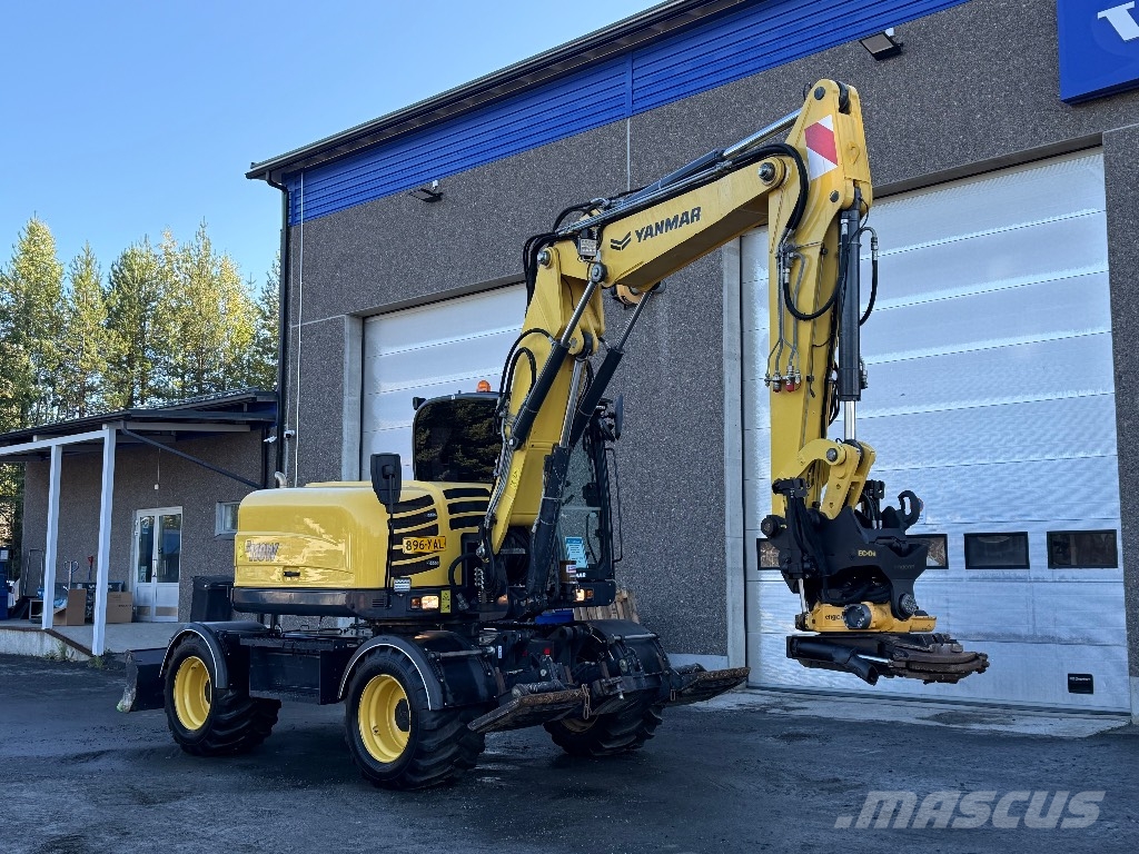 Yanmar B 110 W حفارات بعجل