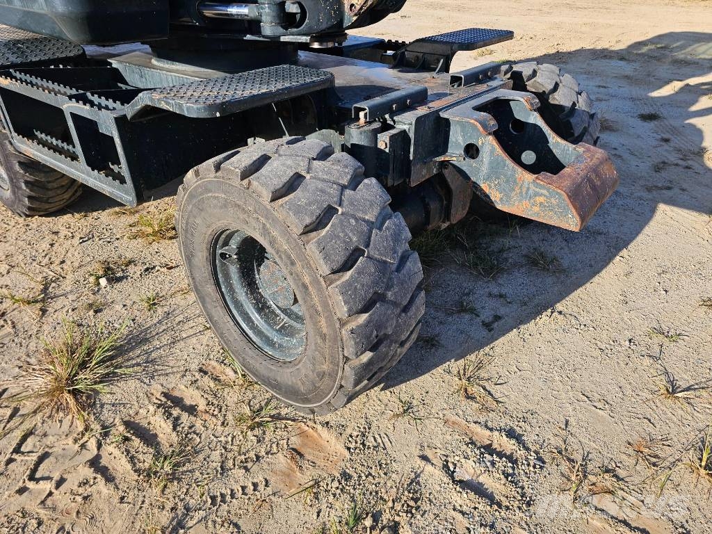 Hyundai HW 60 حفارات بعجل