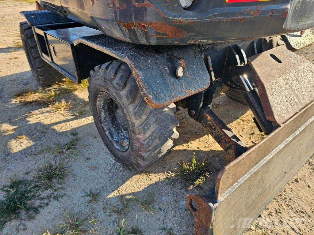 Hyundai HW 60 حفارات بعجل