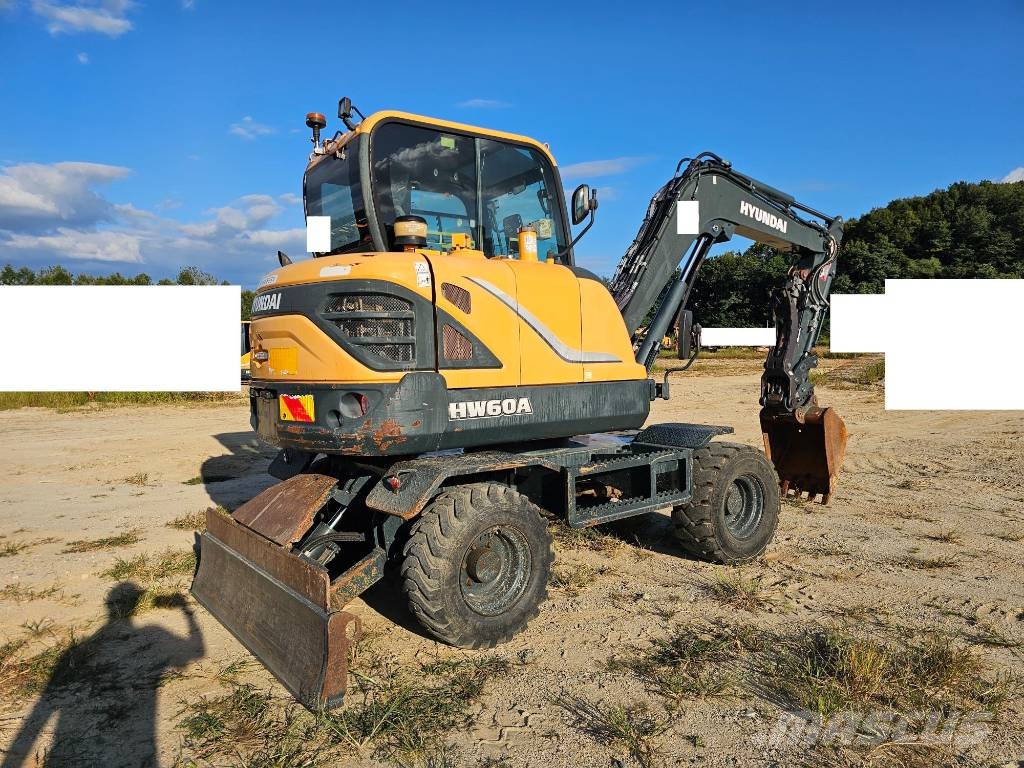 Hyundai HW 60 حفارات بعجل