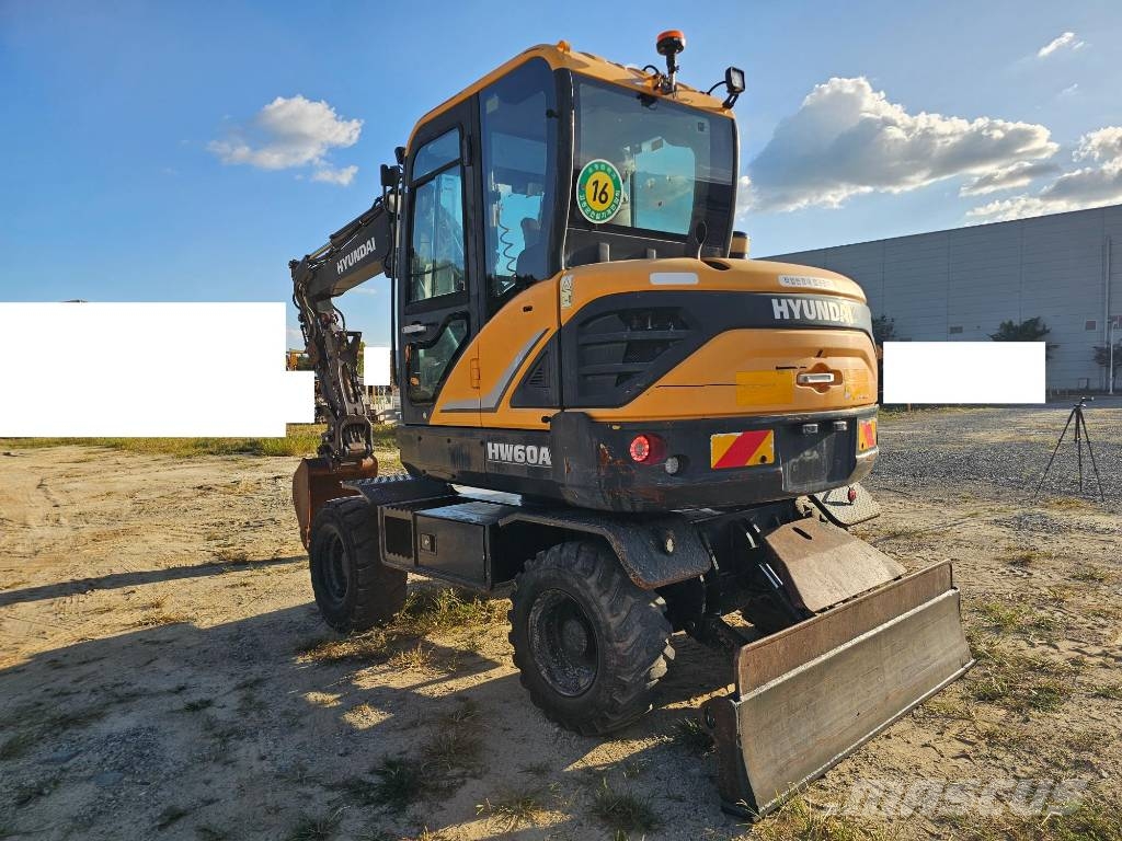Hyundai HW 60 حفارات بعجل