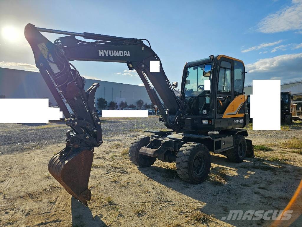 Hyundai HW 60 حفارات بعجل