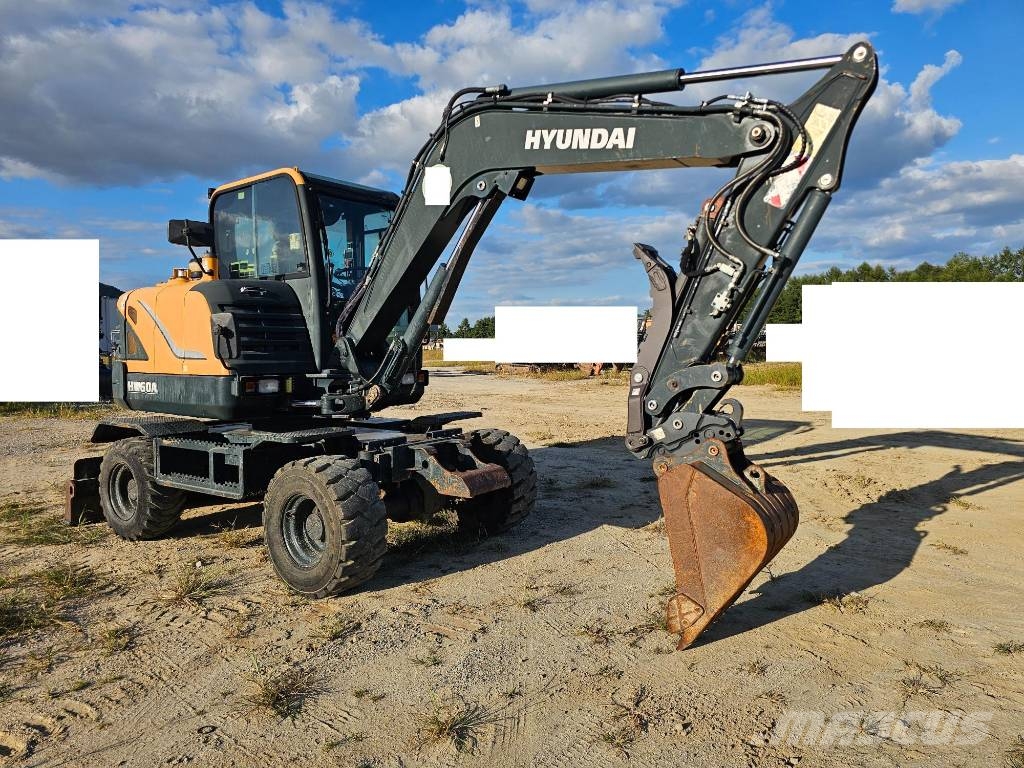Hyundai HW 60 حفارات بعجل