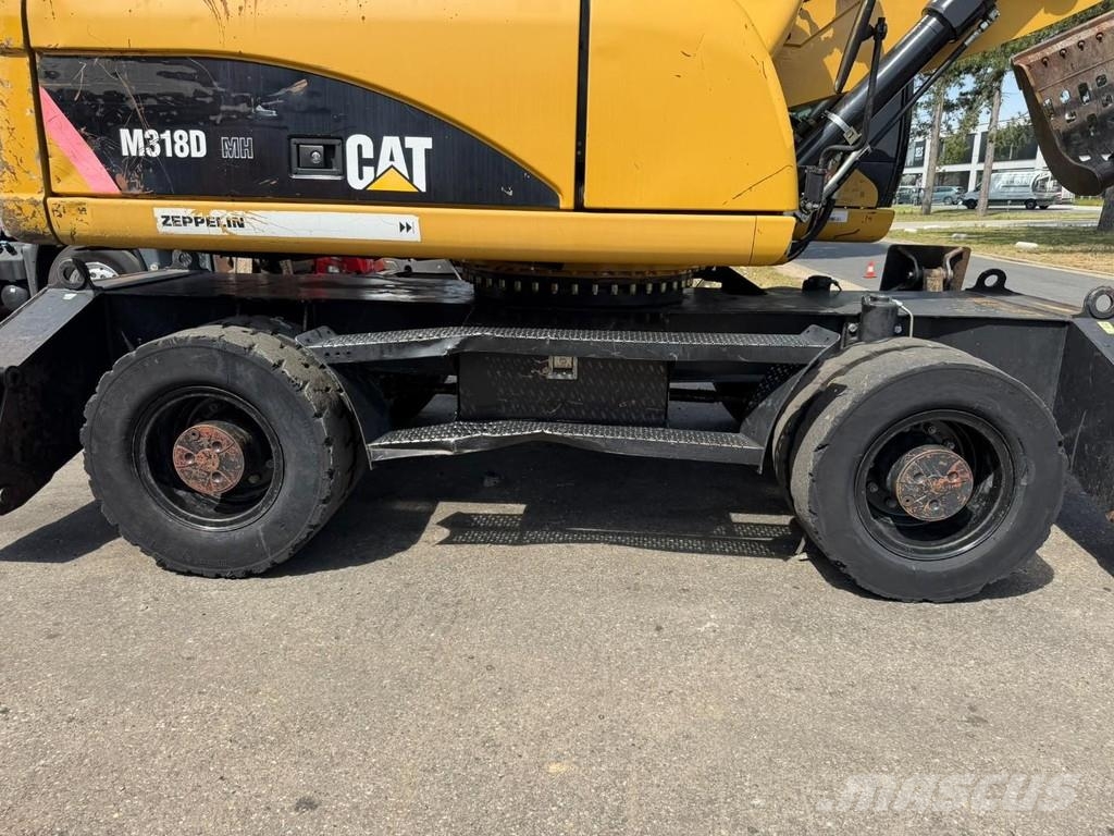CAT M 318 D OVERSLAGKRAAN / MATERIAL HANDLER / UMSCHLA Manejadores de residuos industriales