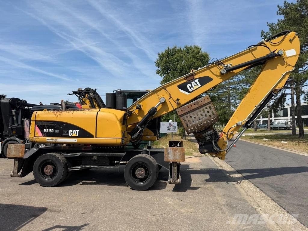CAT M 318 D OVERSLAGKRAAN / MATERIAL HANDLER / UMSCHLA Manejadores de residuos industriales