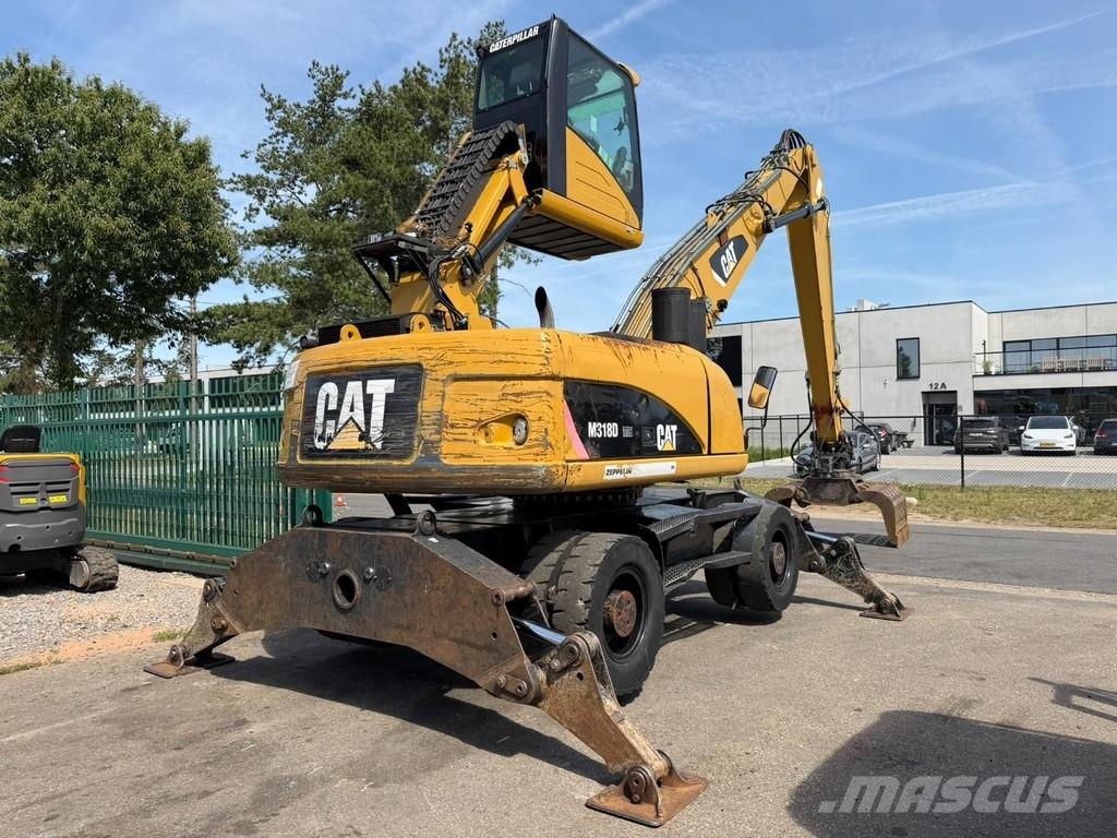 CAT M 318 D OVERSLAGKRAAN / MATERIAL HANDLER / UMSCHLA Manejadores de residuos industriales