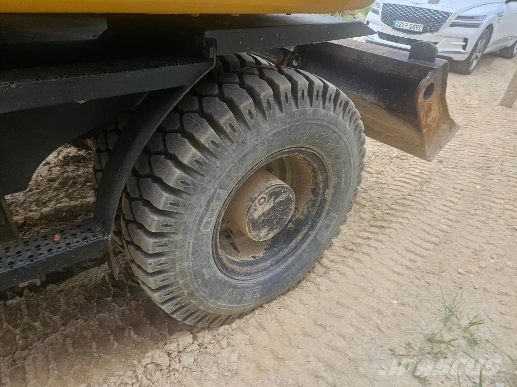 CAT M314F حفارات بعجل