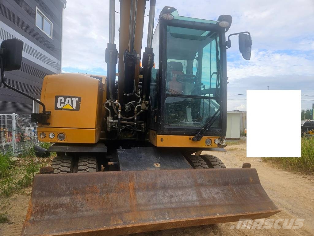 CAT M314F حفارات بعجل