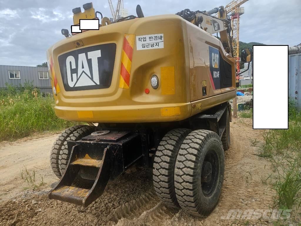 CAT M314F حفارات بعجل