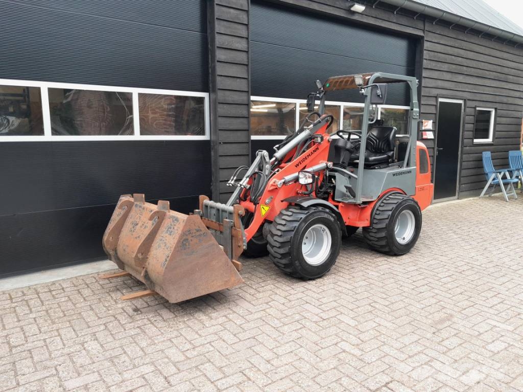 Weidemann 1250 cc 35 minishovel NL-kenteken Brede banden Mini chargeuse