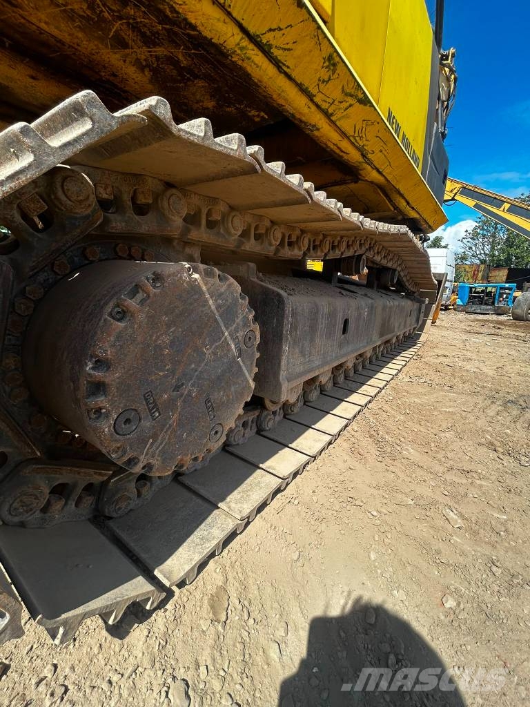 New Holland E 265 C Rupsgraafmachines