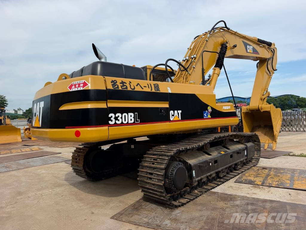 CAT 330 Гусеничні екскаватори