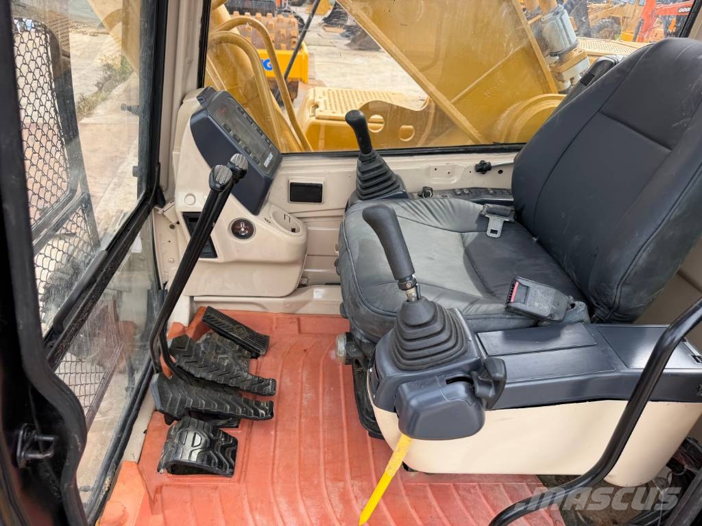 CAT 330 Гусеничні екскаватори