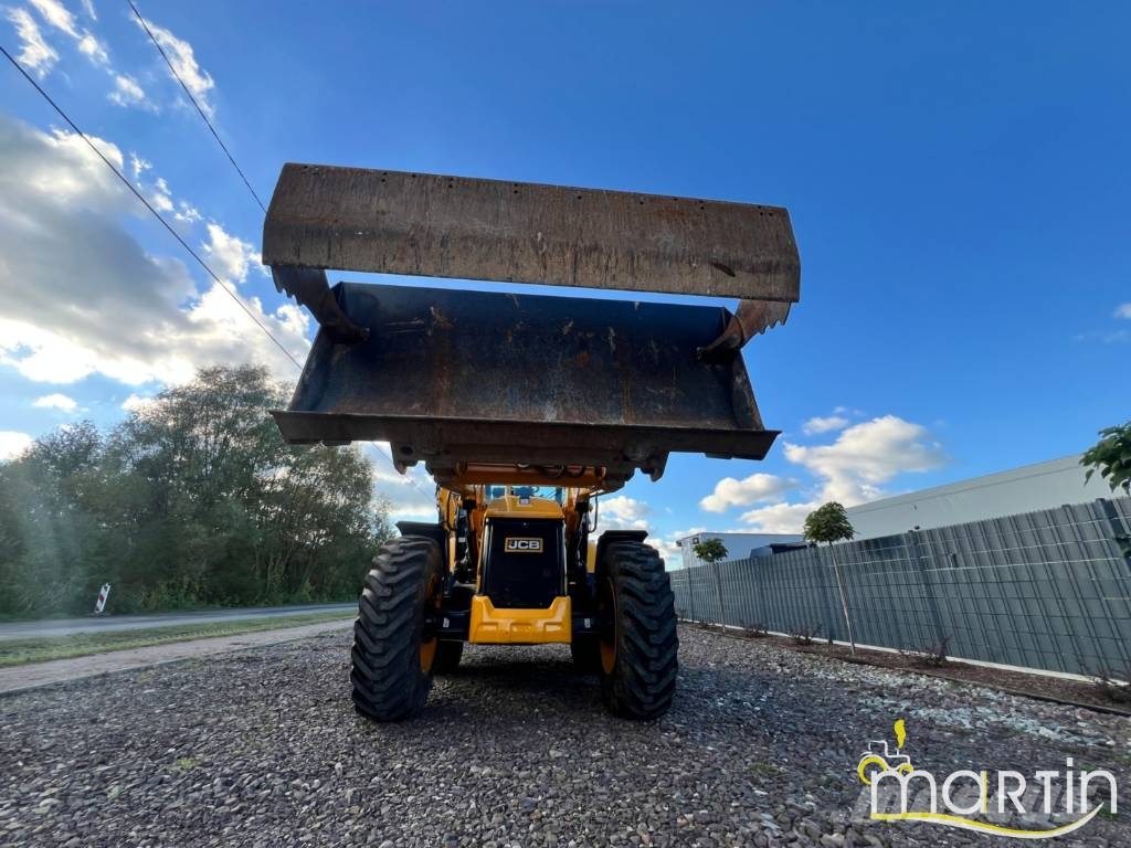 JCB 4 CX Pro لوادر ذات جرافات عكسية