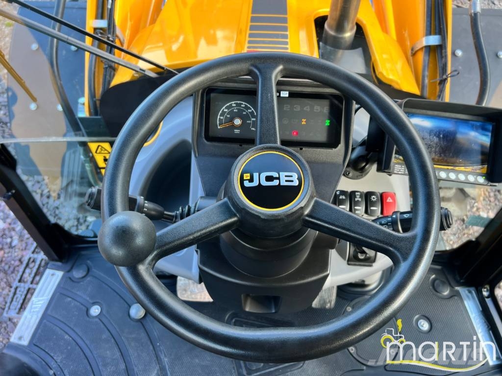 JCB 4 CX Pro لوادر ذات جرافات عكسية