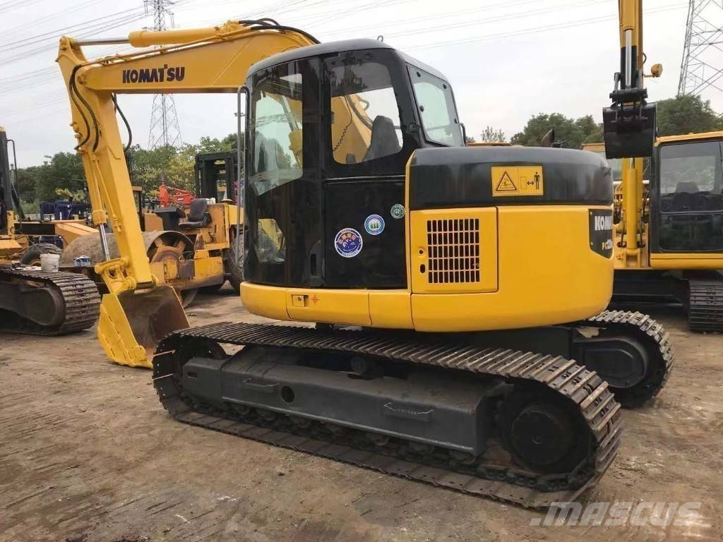 Komatsu PC 128 US حفارات وسط 7 طن - 12 طن
