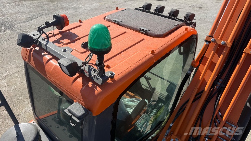 Dossan DX225LC-5 Bandgrävare