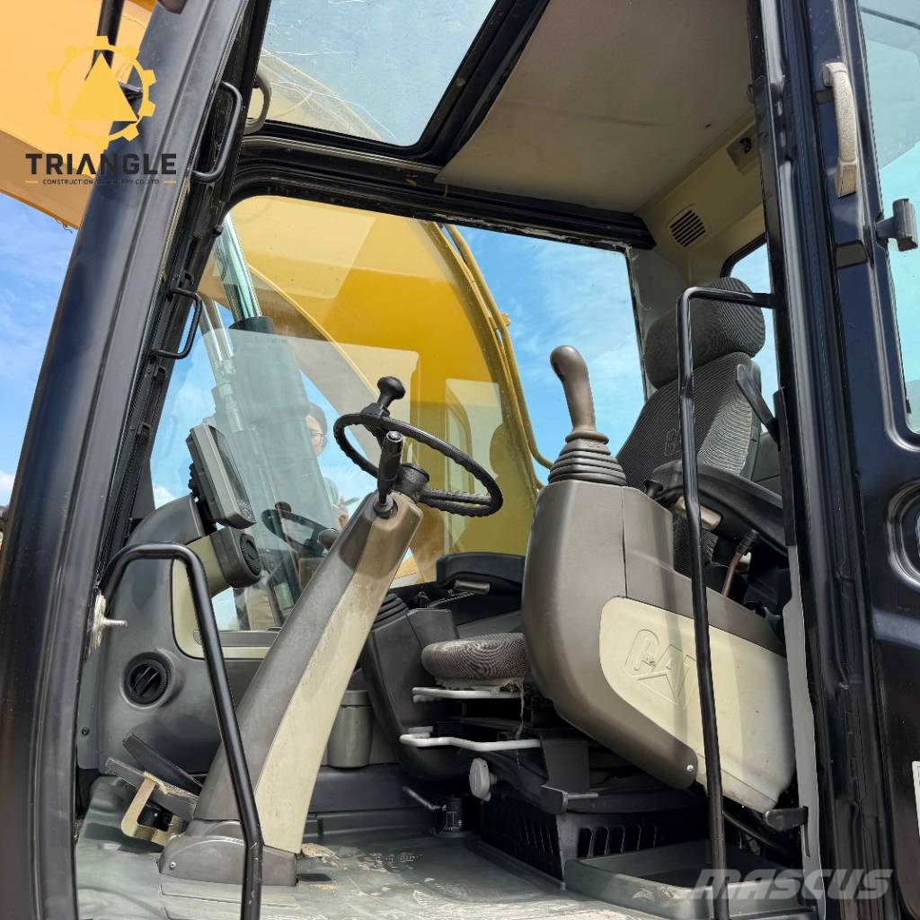 CAT M 320 Bagri na kolesih