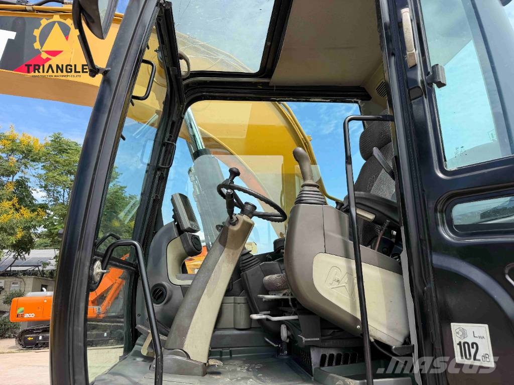 CAT M 320 Bagri na kolesih