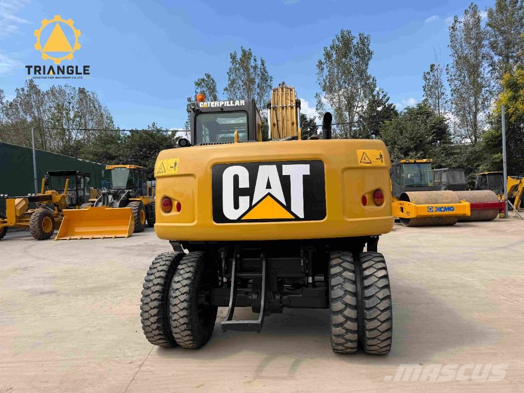 CAT M 320 Bagri na kolesih