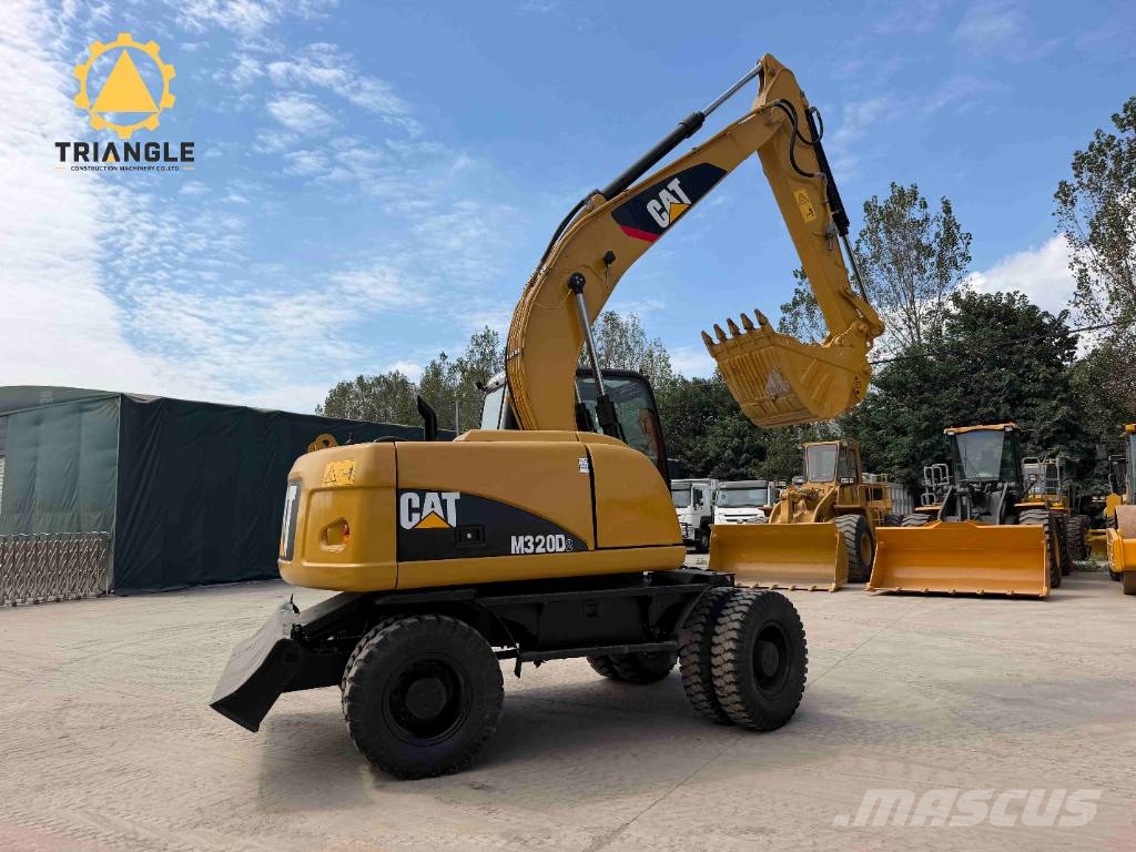 CAT M 320 Bagri na kolesih