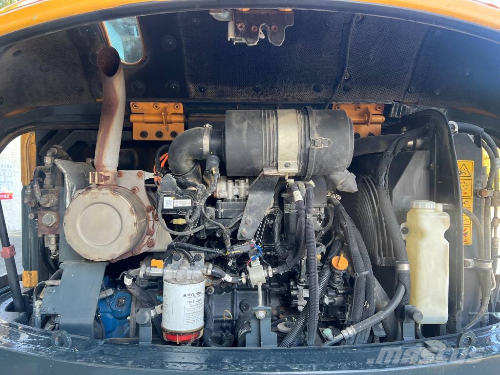 Hyundai HW 60 حفارات بعجل
