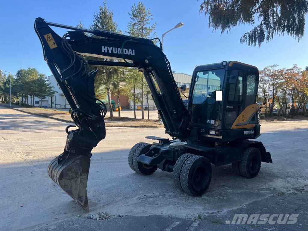 Hyundai HW 60 حفارات بعجل