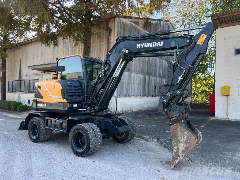 Hyundai HW 60 حفارات بعجل