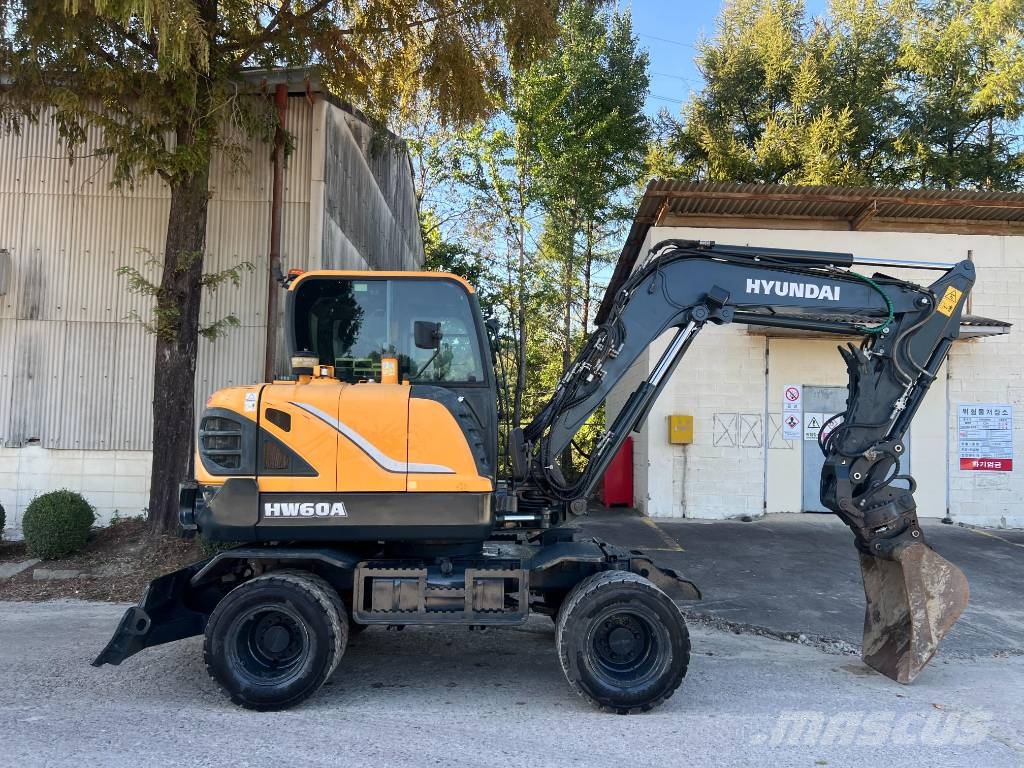 Hyundai HW 60 حفارات بعجل