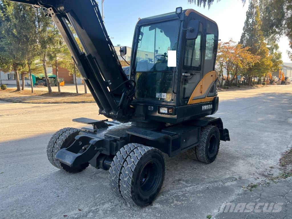 Hyundai HW 60 حفارات بعجل