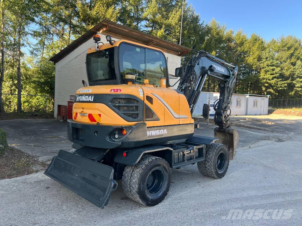 Hyundai HW 60 حفارات بعجل