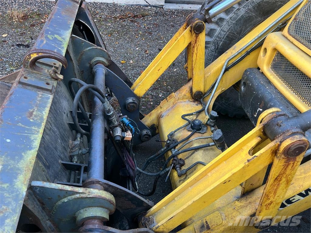 New Holland B115-4PS Baggerlader