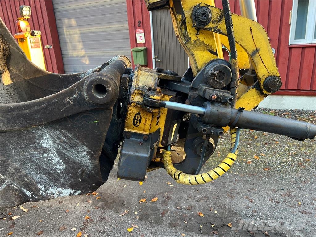 New Holland B115-4PS Baggerlader