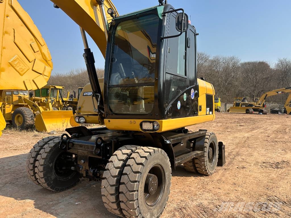 CAT M320D Bagri na kolesih