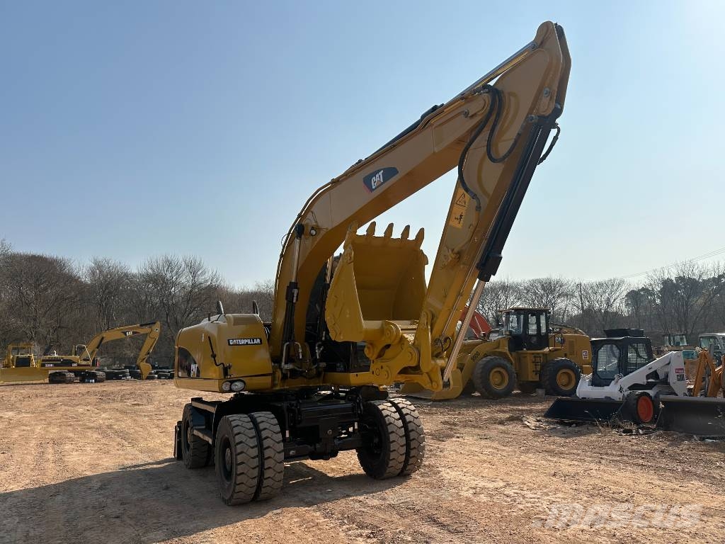 CAT M320D Bagri na kolesih