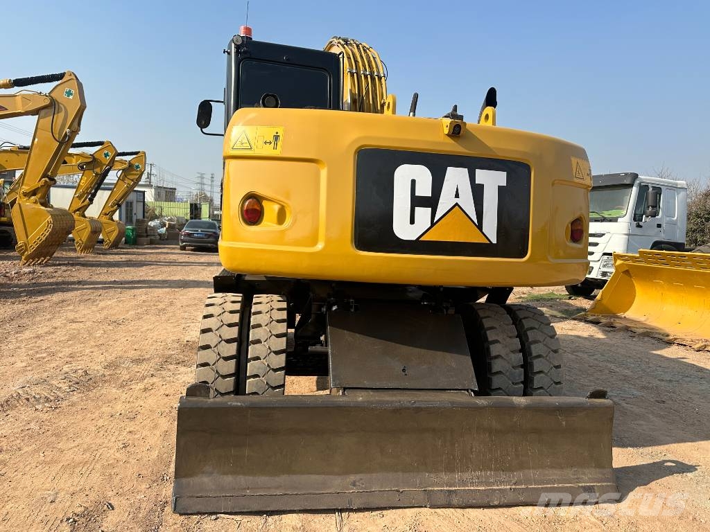 CAT M320D Bagri na kolesih