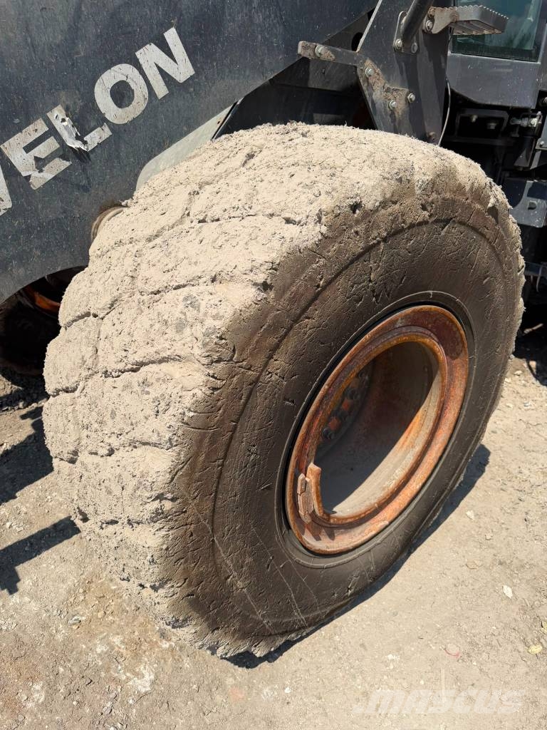 Develon DL 320-7 لوادر بعجل