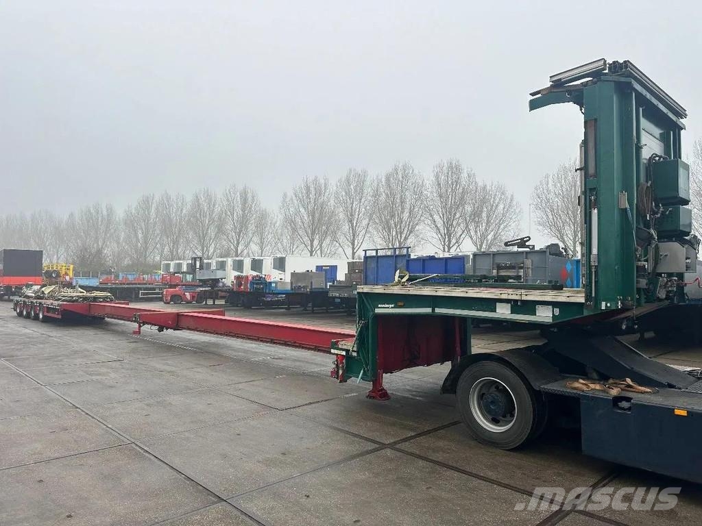 Meusburger 4 AXLE STEERING - DOUBLE EXTENDABLE UP TO 28 M - E نصف مقطورة مسطحة منخفضة