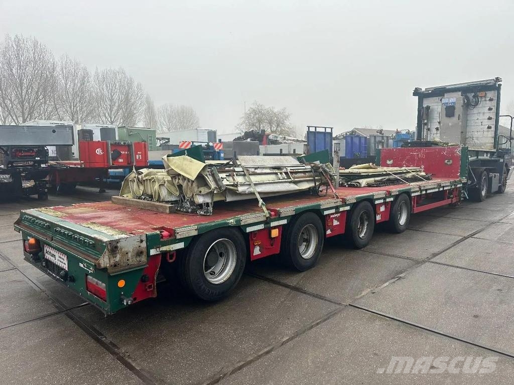 Meusburger 4 AXLE STEERING - DOUBLE EXTENDABLE UP TO 28 M - E نصف مقطورة مسطحة منخفضة